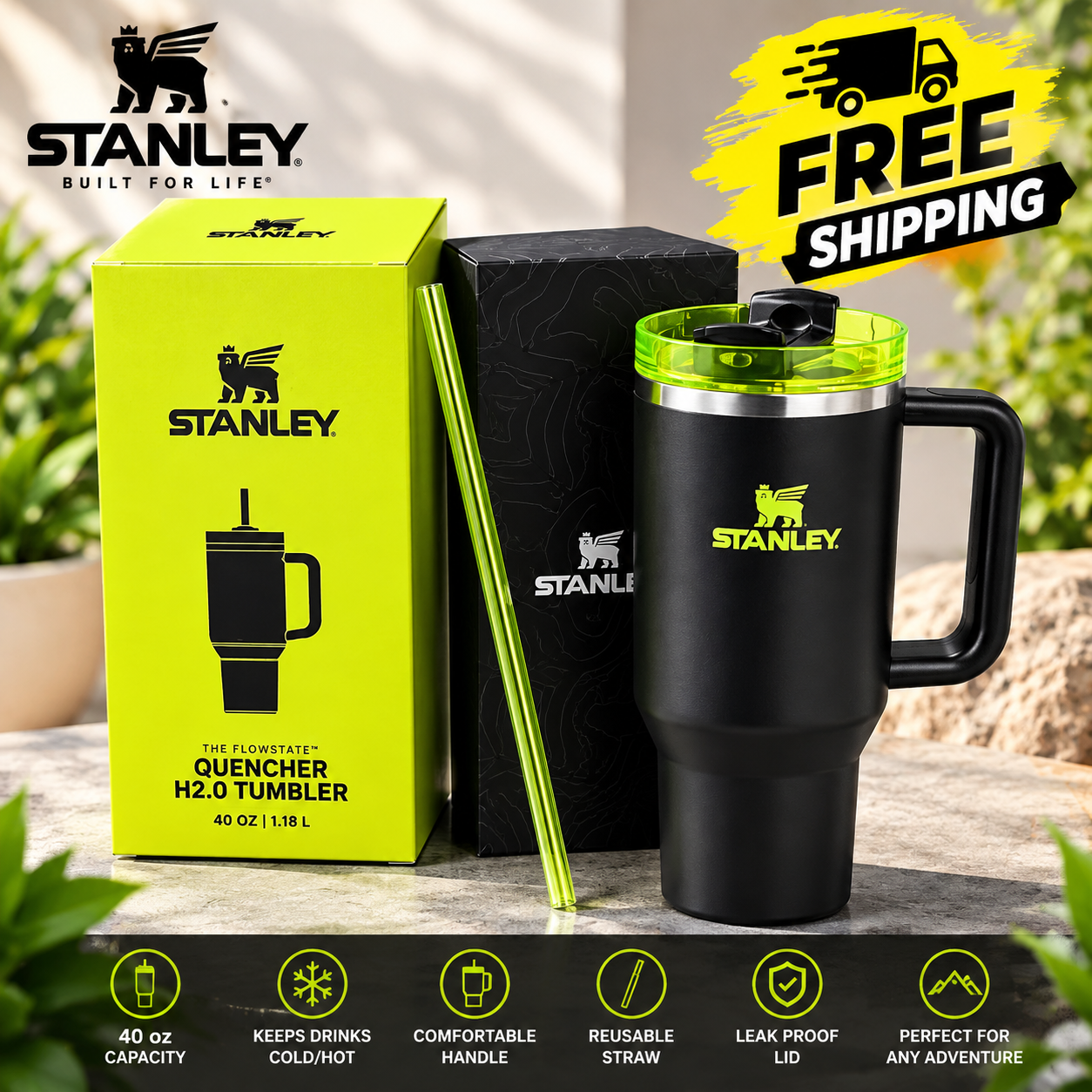 40 oz black insulated tumbler with handle and reusable straw outdoors